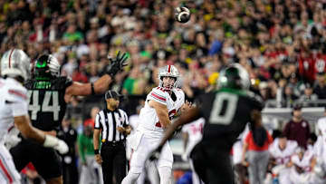 Ohio State quarterback Will Howard passes against Oregon on Saturday.