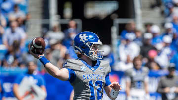 Kentucky quarterback Brock Vandagriff (12) dropped back for a pass during the Kentucky Wildcats' Blue White scrimmage at Kroger Field on Saturday afternoon in Lexington, Kentucky. April 13, 2024