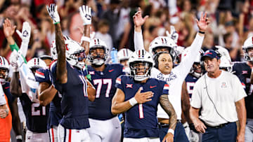 Sep 12, 2025; Tucson, Arizona, USA; Arizona Wildcats quarterback Noah Fifita (1) and teammates celebrate after the touchdown they made is confirmed by replay against the Kansas State Wildcats during the second quarter of the game at Arizona Stadium. Mandatory Credit: Aryanna Frank-Imagn Images