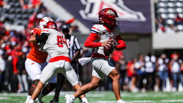 Oct 4, 2025; Tucson, Arizona, USA; Arizona Wildcats quarterback Noah Fifita (1) looks to pass the ball against the Oklahoma State Cowboys during the first quarter at Arizona Stadium. Mandatory Credit: Aryanna Frank-Imagn Images