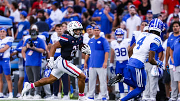 Oct 11, 2025; Tucson, Arizona, USA; Arizona Wildcats running back Quincy Craig (24) runs a first down during the first quarter of the game against the Brigham Young Cougars at Arizona Stadium. Mandatory Credit: Aryanna Frank-Imagn Images