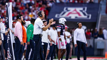 Oct 11, 2025; Tucson, Arizona, USA; Arizona Wildcats head coach Brent Brennan claps on the sidelines during the first quarter of the game against the Brigham Young Cougars at Arizona Stadium. Mandatory Credit: Aryanna Frank-Imagn Images