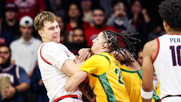 Nov 29, 2025; Tucson, Arizona, USA; Norfolk State Spartans guard Jordan Leaks (20) attempts to steal the ball from Arizona Wildcats center Motiejus Krivas (13) during the first half at McKale Memorial Center. Mandatory Credit: Aryanna Frank-Imagn Images