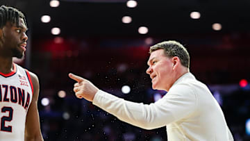 Nov 29, 2025; Tucson, Arizona, USA; Arizona Wildcats head coach Tommy Lloyd yells at guard Dwayne Aristode (2) during the second half against the Norfolk State Spartans at McKale Memorial Center. Mandatory Credit: Aryanna Frank-Imagn Images