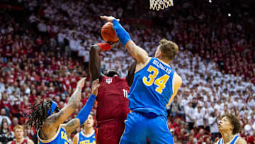 Indiana's Oumar Ballo is blocked by UCLA's Tyler Bilodeau.