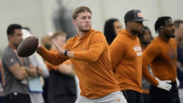 Quarterback Quinn Ewers throws passes to receivers who were participating in Texas Longhorns Football Pro Day at Frank Denius Fields Wednesday March 20, 2024.