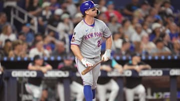 Sep 27, 2025; Miami, Florida, USA; New York Mets first baseman Pete Alonso (20) watches his solo home run against the Miami Marlins in the third inning at loanDepot Park. Mandatory Credit: Jim Rassol-Imagn Images