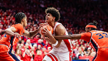 Dec 6, 2025; Tucson, Arizona, USA; Auburn Tigers forward Sebastian Williams-Adams (33) fouls Arizona Wildcats forward Koa Peat (10) during the second half of the game at McKale Memorial Center. Mandatory Credit: Aryanna Frank-Imagn Images