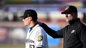 Cleveland Guardians top prospect Travis Bazzana with RubberDucks manager Greg DiCenzo before the start of the home opener against Altoona Curve.