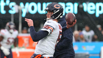 Nov 27, 2022; East Rutherford, New Jersey, USA; Chicago Bears quarterback Trevor Siemian (15) throws a pass during the pregame warmups before the game against the New York Jets at MetLife Stadium. Mandatory Credit: Ed Mulholland-Imagn Images