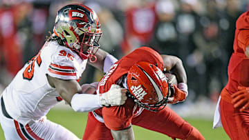 Jacksonville State's J'Wan Evans tries to evade the tackle of Western Kentucky's Deante McCray during college football action at Burgess-Snow Field Jacksonville State Stadium in Jacksonville, Alabama October 17, 2021. (Dave Hyatt: Hyatt Media LLC)