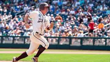 Jun 19, 2022; Omaha, NE, USA; Texas A&M Aggies second baseman Ryan Targac (16) runs to third