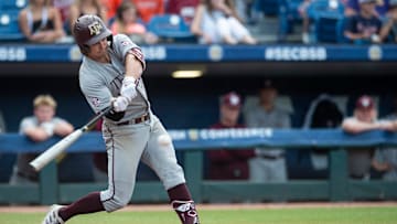 Texas A&M outfielder Dylan Rock (27) swings at the ball as Alabama Crimson Tide takes on Texas