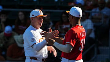 Texas Longhorns head coach Jim Schlossnagle greets Cincinnati Reds infielder Trey Faltine ahead of the annual Texas baseball alumni game at UFCU Disch-Falk Field on Saturday, Feb. 1, 2025.