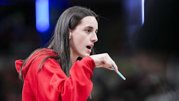 Jun 3, 2025; Indianapolis, Indiana, USA;  Indiana Fever guard Caitlin Clark (22) talks with an official during a timeout at a game between the Indiana Fever and the Washington Mystics at Gainbridge Fieldhouse in Indianapolis.