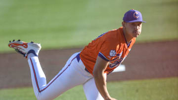 Clemson pitcher Aidan Knaak (19) throws the first pitch to Wake Forest University graduate Matt Scannell (26) during the top of the first inning at Doug Kingsmore Stadium in Clemson, S.C. Friday, March 21, 2025.