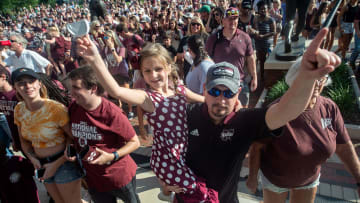 Mississippi State University fans cheer in MSU's 2021 Baseball National Championship parade at the