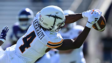 Sep 9, 2023; Evanston, Illinois, USA;  University of Texas El Paso Miners wide receiver Kelly Akharaiyi (4) stretches out to make a catch for a first down in the first half against the Northwestern Wildcats at Ryan Field. Mandatory Credit: Jamie Sabau-USA TODAY Sports