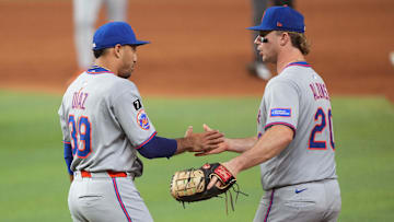 Sep 27, 2025; Miami, Florida, USA;  New York Mets first baseman Pete Alonso (20) congratulates pitcher Edwin Díaz (39) following a victory over the Miami Marlins at loanDepot Park. Mandatory Credit: Jim Rassol-Imagn Images