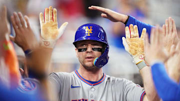 Sep 27, 2025; Miami, Florida, USA; New York Mets first baseman Pete Alonso (20) celebrates his solo home run against the Miami Marlins in the third inning at loanDepot Park. Mandatory Credit: Jim Rassol-Imagn Images