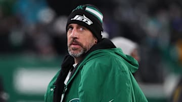 Jan 5, 2025; East Rutherford, New Jersey, USA; New York Jets quarterback Aaron Rodgers (8) during the third quarter of their game against the Miami Dolphins at MetLife Stadium. Mandatory Credit: Ed Mulholland-Imagn Images