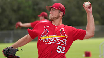 Feb 17, 2023; Jupiter, FL, USA; St. Louis Cardinals starting pitcher Matthew Liberatore (52) warms