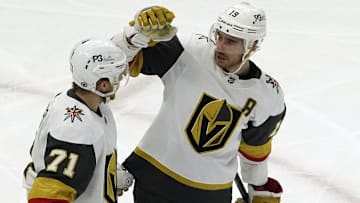 Dec 15, 2022; Chicago, Illinois, USA; Vegas Golden Knights right wing Reilly Smith (19) celebrates his goal with center William Karlsson (71)during the second period at United Center. Mandatory Credit: David Banks-Imagn Images