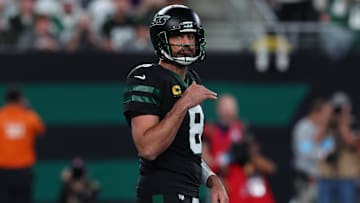 Oct 31, 2024; East Rutherford, New Jersey, USA; New York Jets quarterback Aaron Rodgers (8) during the first half of their game against the Houston Texans at MetLife Stadium. Mandatory Credit: Ed Mulholland-Imagn Images