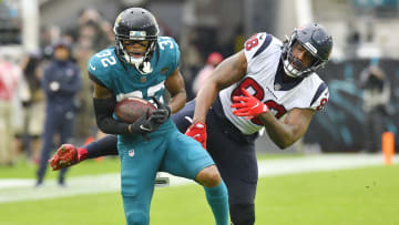 Jacksonville Jaguars cornerback Tyson Campbell (32) intercepts a pass intended for Houston Texans tight end Jordan Akins (88) during fourth quarter action. 