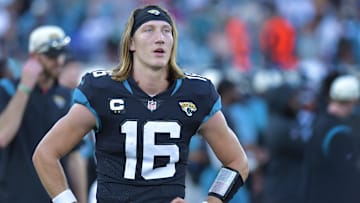 Jacksonville Jaguars quarterback Trevor Lawrence (16) catches his breath as he walks the bench after his game winning drive. The Jacksonville Jaguars hosted the Baltimore Ravens at TIAA Bank Field in Jacksonville, FL Sunday, November 27, 2022. The Jaguars got momentum late in the game to win 28 to 27 over the Ravens. 