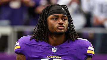 Minnesota Vikings EDGE defender Dallas Turner looks on.