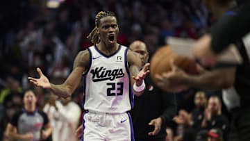 Nov 29, 2024; Portland, Oregon, USA; Sacramento Kings guard Keon Ellis (23) reacts to a referee’s call during the second half against the Portland Trail Blazers at Moda Center. Mandatory Credit: Troy Wayrynen-Imagn Images