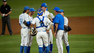 UCLA Bruins team huddles during a break in the action as Auburn Tigers take on UCLA Bruins during the NCAA regional baseball tournament at Plainsman Park in Auburn, Ala., on Sunday, June 5, 2022.