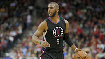 Dec 19, 2015; Houston, TX, USA; Los Angeles Clippers guard Chris Paul (3) dribbles against the Houston Rockets at Toyota Center. Rockets won 107 to 97. Mandatory Credit: Thomas B. Shea-Imagn Images