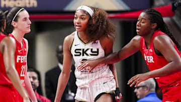 May 17, 2025; Indianapolis, IN, USA;  Chicago Sky forward Angel Reese (5) reacts to a flagrant foul from Indiana Fever guard Caitlin Clark (22) on Saturday, May 17, 2025, during a game between the Indiana Fever and the Chicago Sky at Gainbridge Fieldhouse in Indianapolis. The Indiana Fever defeated the Chicago Sky, 93-58.Mandatory Credit: Grace Smith-IndyStar via Imagn Images