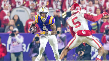 CJ Daniels (4) runs the ball as the LSU Tigers take on the Oklahoma Sooners. Nov 30, 2024; Baton Rouge, Louisiana, USA; at Tiger Stadium.