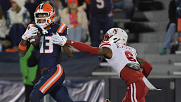 Oct 6, 2023; Champaign, Illinois, USA; Illinois Fighting Illini wide receiver Pat Bryant (13) catches a pass for a touchdown in front of Nebraska Cornhuskers defensive back Quinton Newsome (6) during the first half at Memorial Stadium. Mandatory Credit: Ron Johnson-USA TODAY Sports