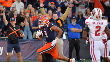 Oct 21, 2023; Champaign, Illinois, USA;  Illinois Fighting Illini running back Kaden Feagin (3) scores a touchdown during the second half against the Wisconsin Badgers at Memorial Stadium. Mandatory Credit: Ron Johnson-USA TODAY Sports