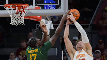 Iowa State Cyclones forward Brandton Chatfield (33) rebounds the ball around Baylor Bears forward Josh Ojianwuna (17) during the first half in the NCAA men’s basketball at Hilton Coliseum on Saturday, Jan. 4, 2025, in Ames, Iowa.