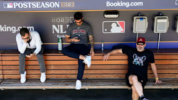 Assistant general manager Amiel Sawdaye, general manager Mike Hazen, and manager Torey Lovullo during batting practice at Dodger Stadium in Los Angeles on Oct. 8, 2023.