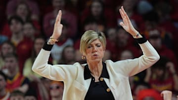 Iowa Hawkeyes women' basketball head coach Jan Jensen reacts from the bench during the third quarter against Iowa State in the NCAA women’s basketball Cy-Hawk Series on Dec. 10, 2025, at Hilton Coliseum in Ames, Iowa.