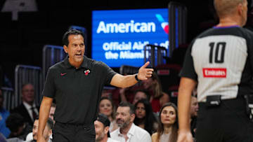 Oct 8, 2025; Miami, Florida, USA;  Miami Heat head coach Erik Spoelstra has a few words with the officials over a call during the first half of the game against the San Antonio Spurs at Kaseya Center. Mandatory Credit: Jim Rassol-Imagn Images