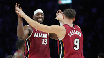 Nov 24, 2025; Miami, Florida, USA; Miami Heat center Bam Adebayo (13) and Miami Heat guard Pelle Larsson (9) celebrate the win over the Dallas Mavericks at Kaseya Center. Mandatory Credit: Jim Rassol-Imagn Images