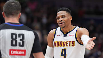 Dec 22, 2024; New Orleans, Louisiana, USA; Denver Nuggets guard Russell Westbrook (4) talks to referee Andy Nagy (83) during overtime against the New Orleans Pelicans at Smoothie King Center. Mandatory Credit: Matthew Hinton-Imagn Images