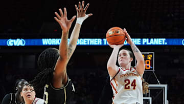 Iowa State Cyclones' forward Addy Brown (24) shoots the ball over UCF Knights center Khyala Ngodu (35) during the fourth quarter in the Big-12 women’s basketball at Hilton Coliseum on Saturday, Jan. 25, 2025, in Ames, Iowa.
