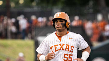 Texas Longhorns outfielder Jonah Williams (55) runs in from the outfield in the fourth inning as the Longhorns play the Auburn Tigers in the second game of a three-game series on Friday night at UFCU Disch-Falk Field in Austin, April 18, 2025.