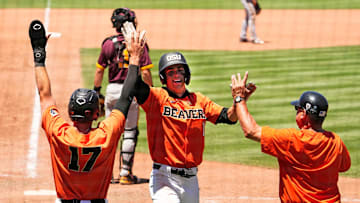 Oregon State's Gavin Turley (1) celebrates after hitting a 3-run inside-the-park home run against Arizona State in the ninth inning during the Pac-12 Tournament at Scottsdale Stadium on May 25, 2023.