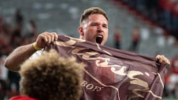 Oct 9, 2021; Lincoln, Nebraska, USA; Former Nebraska Cornhuskers and NFL linebacker Will Compton pumps up the crowd during the second quarter at Memorial Stadium. Mandatory Credit: Dylan Widger-Imagn Images
