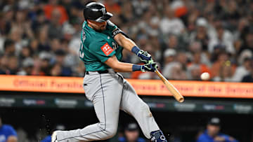 Seattle Mariners designated hitter Cal Raleigh hits a grand slam home run against the Detroit Tigers.
