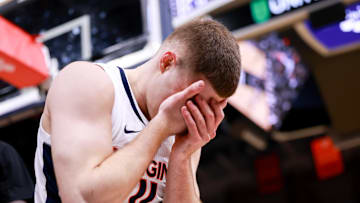 Mar 4, 2025; Charlottesville, Virginia, USA; Virginia Cavaliers guard Isaac McKneely (11) reacts after a play in the second half against the Florida State Seminoles at John Paul Jones Arena. Mandatory Credit: Emily Faith Morgan-Imagn Images